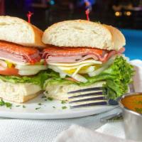 Italian Sub · For this amazing sub we use Black Forest ham, salami, pepperoni, capicola and provolone chee...