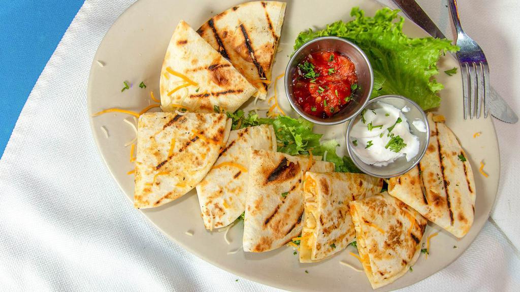 Chicken Quesadillas · Two quesadillas with chicken, cheese, and chopped jalapeños. Served with salsa and sour cream.