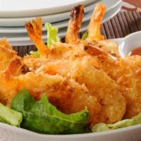 Coconut Shrimp · 6 pieces of fried coconut shrimp served with our sweet chili sauce.