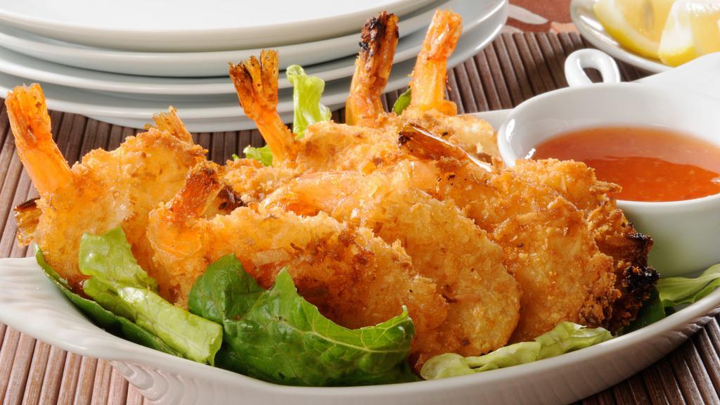 Coconut Shrimp · 6 pieces of fried coconut shrimp served with our sweet chili sauce.