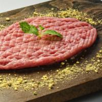 Raw Kibbeh Plate · Doily fresh - lean cut of lamb is fine ground and mixed row with cracked wheat, natural herb...