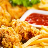 Chicken Tender · 5 pieces of fried chicken tender with French fries.