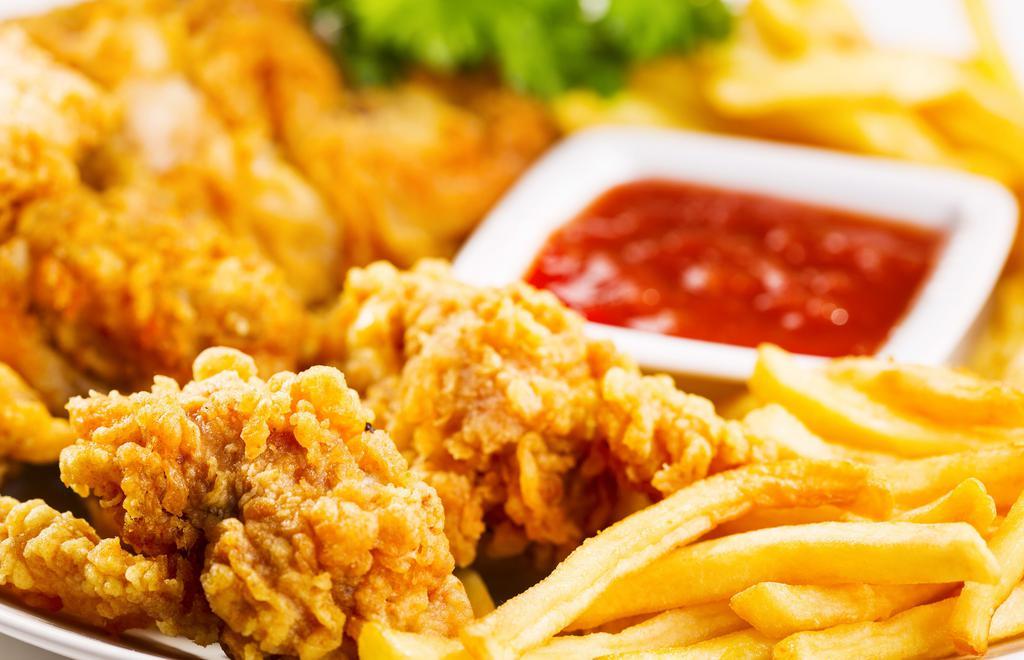 Chicken Tender · 5 pieces of fried chicken tender with French fries.