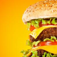 Double Cheeseburger · 2 fresh ground beef patties, American cheese, lettuce, tomatoes, pickles, onion with our hou...