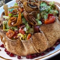 Sky Fattoush Salad · Fried pita bowl filled with lettuce, tomatoes, parsley, red cabbage, cucumber, sweet peppers...