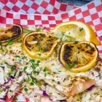 Mediterranean Walleye · Canadian walleye, Italian spices, lemon butter and white wine.