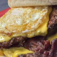 Sunrise Burger (1/2 Pound) · Egg to order, bacon and American cheese, lettuce, tomato, onions, pickles by request. Includ...