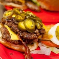 Bacon Jalapeño Burger (1/2 Pound) · Grilled jalapeños, bacon, and American cheese, lettuce, tomato, onions, pickles by request. ...