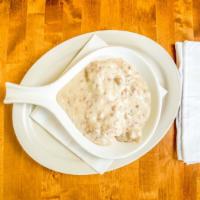 Biscuit & Gravy Combo · 2 any style eggs & choice of breakfast meat smothered in sausage gravy.