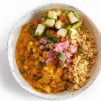 Curried Vegetables Bowl · cauliflower rice, vegetables mixed in curry sauce, cucumber-tomato, topped with pickled onio...