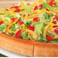 Taco Pie · This pie starts with a Spicy Taco sauce and is topped with seasoned Beef, diced Onions, Ched...