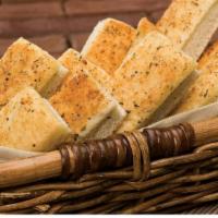 Breadsticks (4) · Warm, buttery and baked to perfection. Our Breadsticks are seasoned with a blend of Garlic, ...