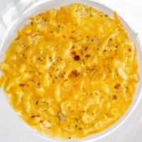 Traditional Mac & Cheese · Our creamy, delicious mac & cheese topped with your favorite selection.