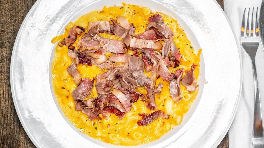 Brisket Mac & Cheese · Our creamy, delicious mac & cheese topped with brisket.