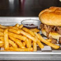 Pulled Pork Sandwich · Pulled Pork served on a house bun. Choice of side.
