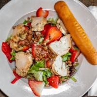 Chicken Strawberry Salad · Mixed greens, topped with grilled chicken, feta cheese, fresh strawberries, candied pecans a...