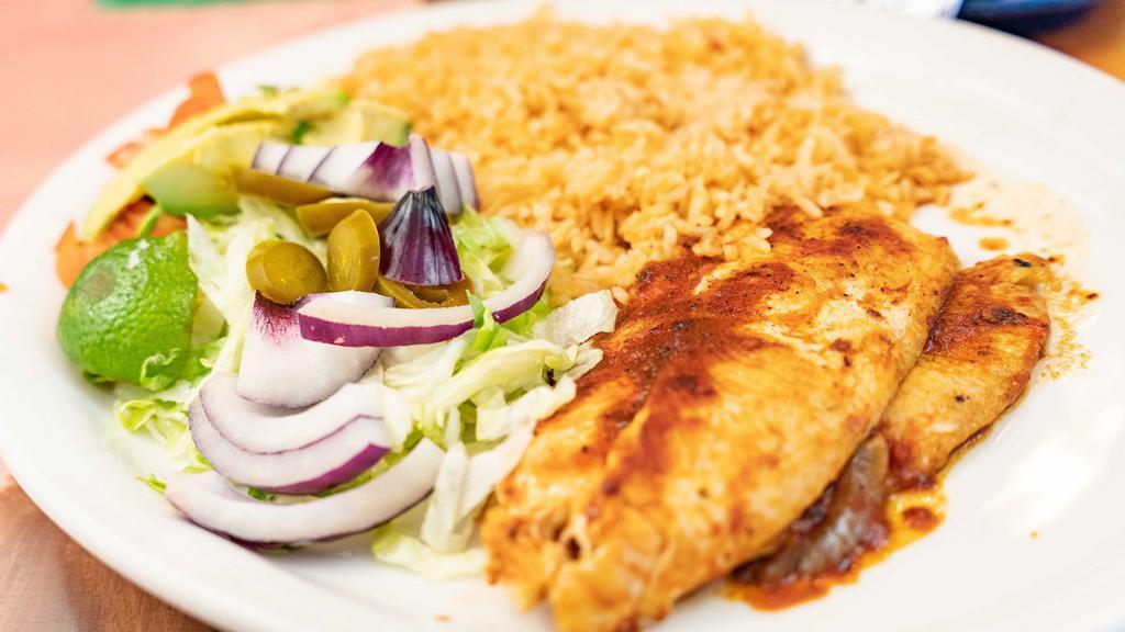 Pollo Loco · Serving of boneless chicken breast deliciously marinated and served with rice, tortillas and avocado salad.