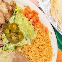 Carnitas · Pork tips, rice, beans, and salad. Served with tortillas.