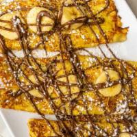 Hazelnut Banana Crepes · Our delicious crepes filled with sliced bananas and Nutella chocolate hazelnut spread. Finis...