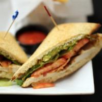 Chicken Avocado Club · Grilled chicken breast, avocado, bacon, lettuce, tomatoes, bistro sauce, mayo and provolone ...