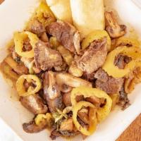 Cajun Filet Bites · Pan-seared seasoned filet with zip sauce, banana peppers, and mushrooms.