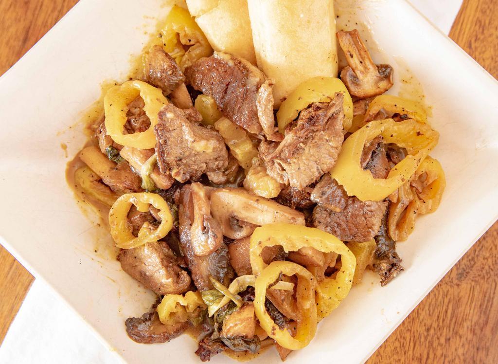 Cajun Filet Bites · Pan-seared seasoned filet with zip sauce, banana peppers, and mushrooms.