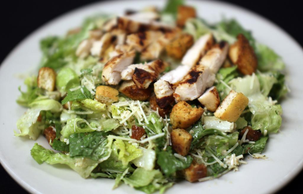 Caesar Salad · Fresh romaine, Parmesan cheese, croutons, and creamy Caesar. Add chicken, salmon, shrimp for additional charges.