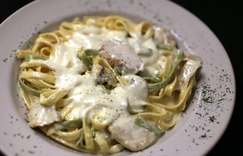 Chicken Fettuccine Alfredo · Grilled chicken in a creamy house-made Alfredo. Add broccoli, substitute shrimp for additional charges.