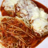 Eggplant Parmesan · Fresh breaded eggplant, marinara, baked four-cheese blend, and a side of pasta with marinara.
