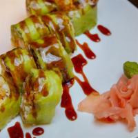 Rock'N Roll · Shrimp tempura, crab stick, avocado, mayo sauce, and masago, wrapped with soybean paper, wit...