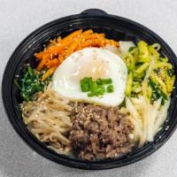 Classic Bibimbap · Steamed rice topped with a variety of seasoned vegetables and fried egg.