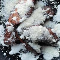 Fried Plantains · Fried Plantains served with house-made crema and cotija cheese.  Gluten Free, but potential ...