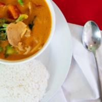 E10 . Vegetablesetable Curry · Sautéed in red curry sauce, coconut milk with bamboo shoots, bell pepper, broccoli, cabbage,...