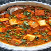 Mattar Paneer · Green peas cooked with homemade cottage cheese in tastefully spiced mild onion and tomato sa...