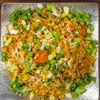 Vegetable Biryani · Saffron basmati rice cooked with a medley of garden-fresh vegetables blended with specially ...