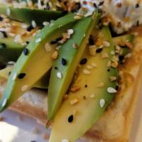 Avocado & Onion/Chive Cream Cheese Waffle · 1 Large Belgium waffle topped with 1/2 sliced avocado, onion & chive cream cheese spread, ev...