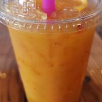 Orange Mango Refresher · Fresh mango puree, orange juice and topped with orange slice. 12oz