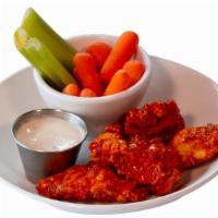 Hopkittens Boneless Wings · 4 hand-breaded jumbo chicken wings served with buttermilk ranch or bleu cheese dressing. Tos...