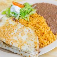 Flour Quesadilla · Come with rice and beans with your choice of meat (Asada, Pollo, Pastor, or Carnitas)