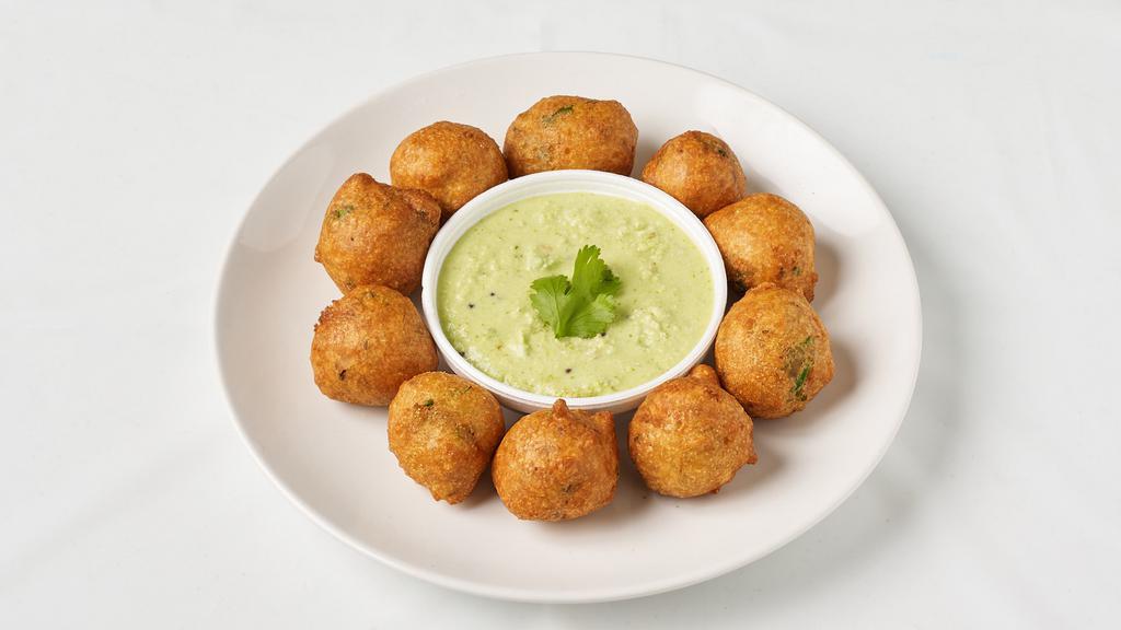 Goli Bajji (8) · Savoury hush puppies with ginger and cumin with coconut chutney.