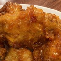 Spicy Chili Wings · Fried chicken wings combined with our special recipe chili sauce
