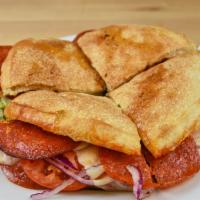 Pepperoni Panino · Imported Pepperoni with melted provolone cheese, lettuce, tomato and red onion. Our homemade...