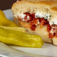 Goat Cheese Panino · Goat cheese and sun-dried tomato, brushed with olive oil and topped with fresh basil.