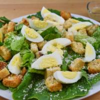 Caesar Salad · Romaine lettuce, garlic croutons, Romano cheese, hard-boiled eggs. Served with Caesar dressi...