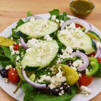 Greek Salad · Romaine lettuce, feta cheese, Kalamata olives, cucumber, green pepper, red onion, tomato, pe...