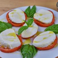 Caprese Salad · Fresh mozzarella cheese, tomato, basil, drizzled with imported olive oil. Served with balsam...