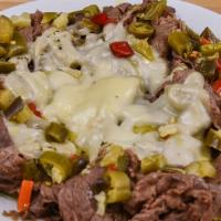 Italian Beef Dish · Beef au jus, baked with provolone cheese.