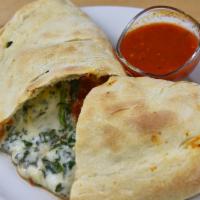 Calzone W/ Cheese · Add Toppings of your choice. We recommend selecting up to 4 ingredients/toppings.

Can be a ...