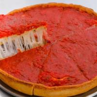 10” Stuffed Cheese Pizza · Like our pan pizza but stuffed with more cheese and another thin layer of dough just beneath...