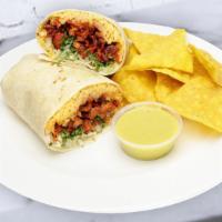 Burritos · Large flour tortilla filled with rice, beans and your choice of meat prepared with cilantro,...